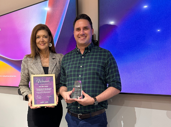 Pictured: LGAQ Chief Executive Office Alison Smith presenting Alison Woolla Award to Ben Bjarnesen